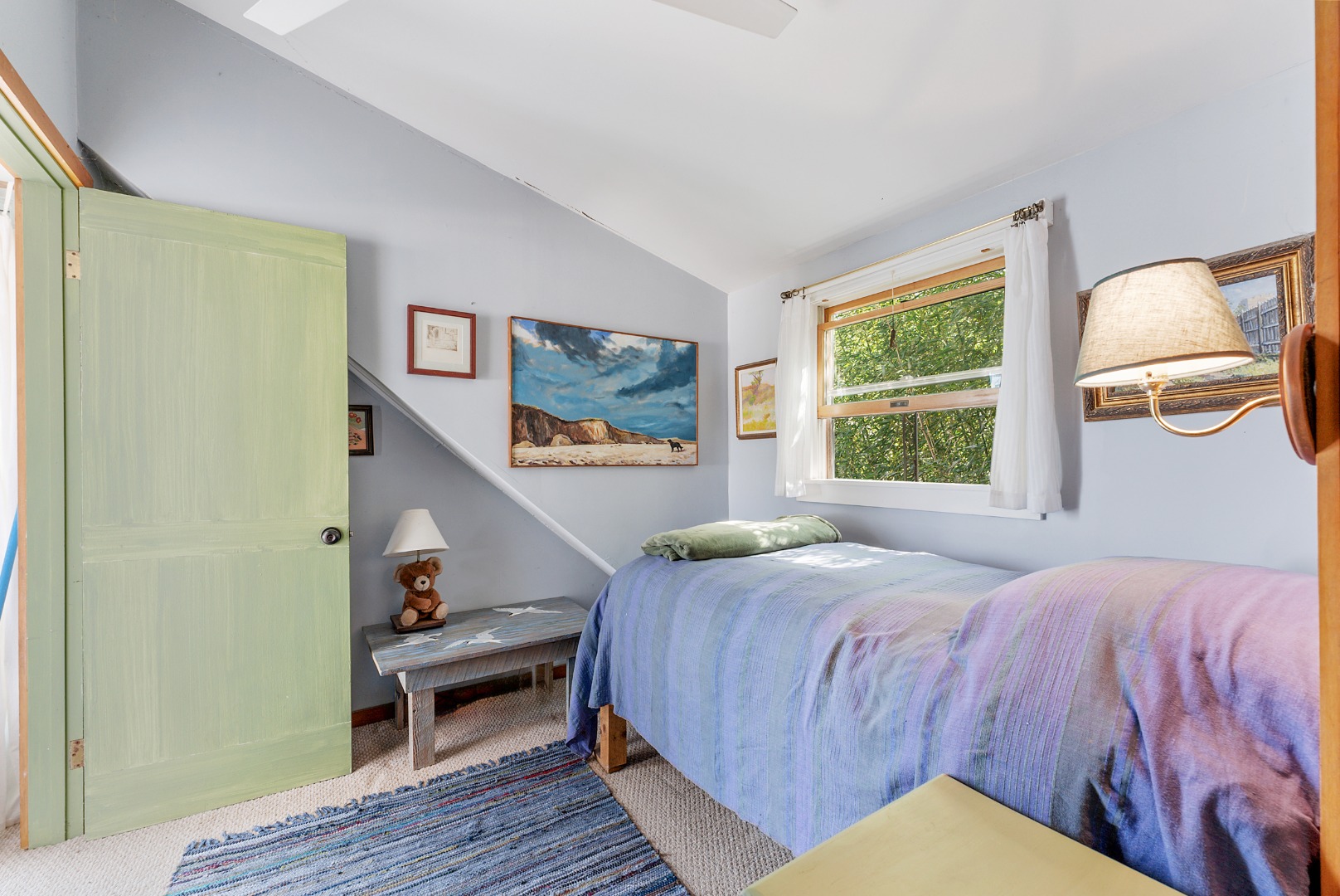 129 Beach Road Vineyard Haven, MA 02568 - Photo 38 of 71 a bedroom with a bed and wooden floor
