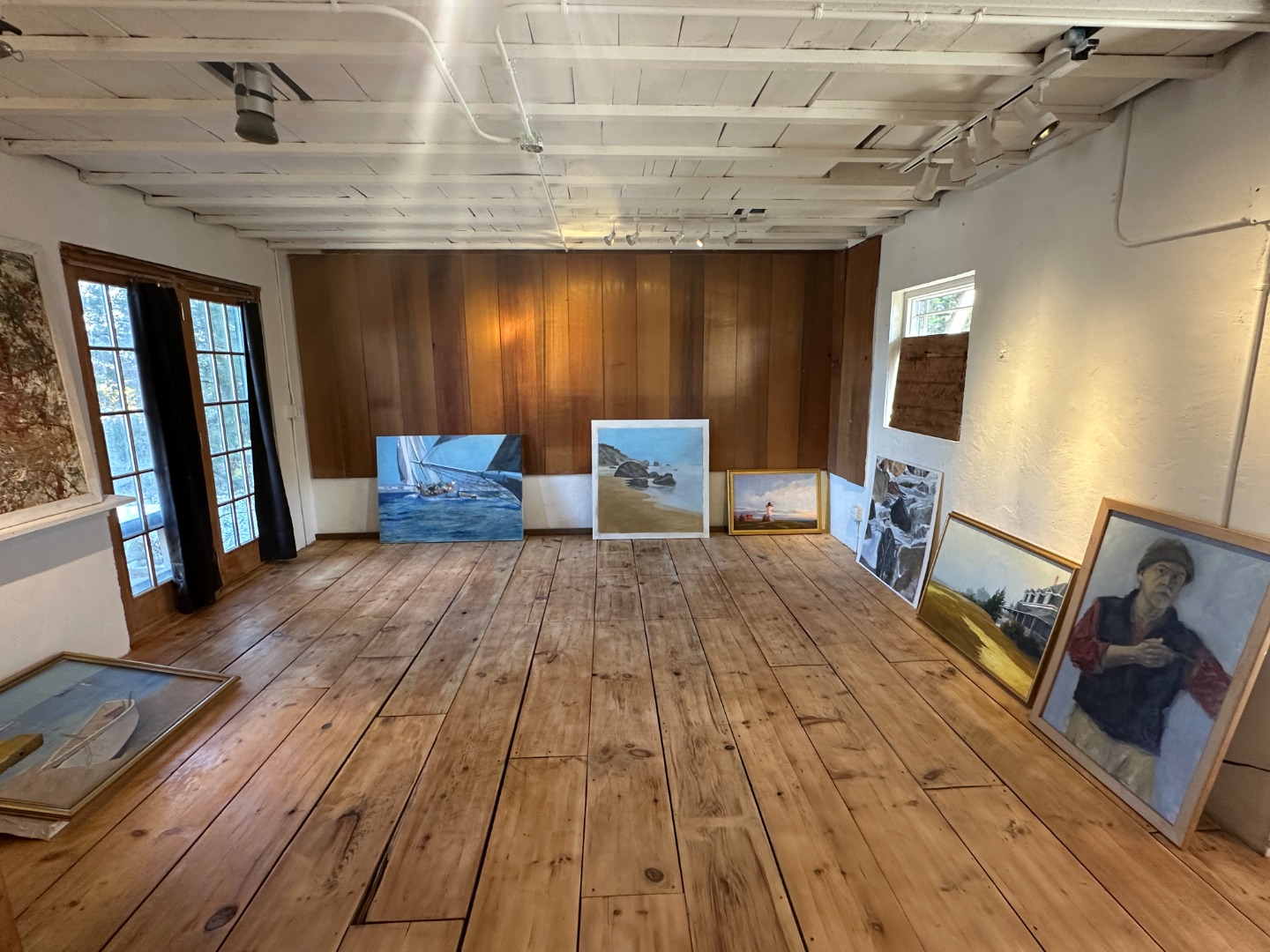 129 Beach Road Vineyard Haven, MA 02568 - Photo 64 of 71 a bedroom with a bed and wooden floor