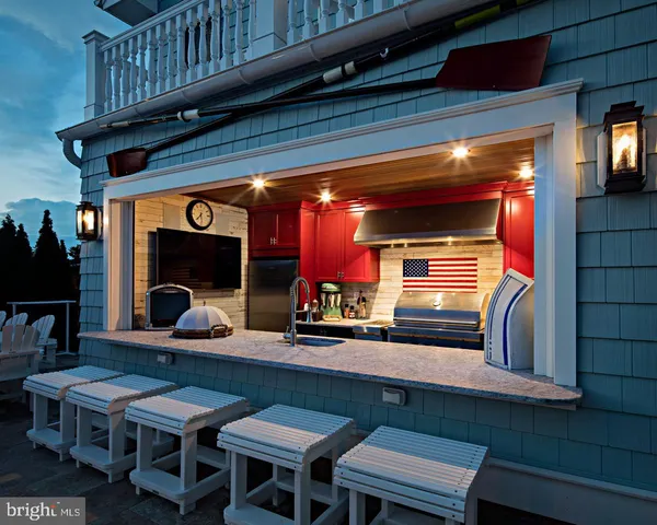 a kitchen with a table and chairs in it