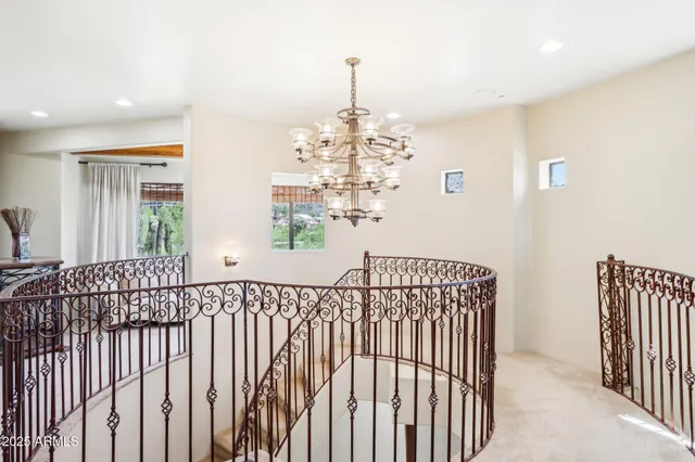 a view of a hallway with windows