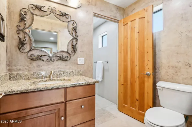 a workspace with furniture and wooden floor