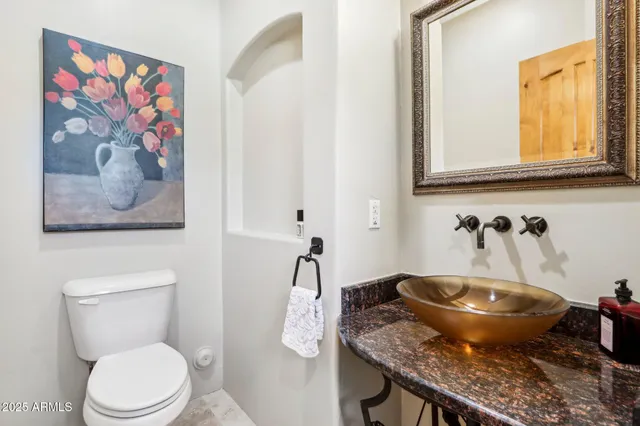 a view of a terrace with a table and chairs