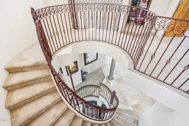 a view of a porch with furniture and garden