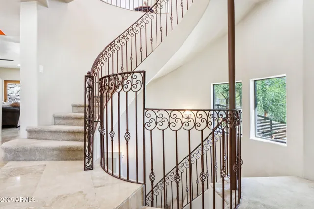 a picture of a room with furniture and white walls