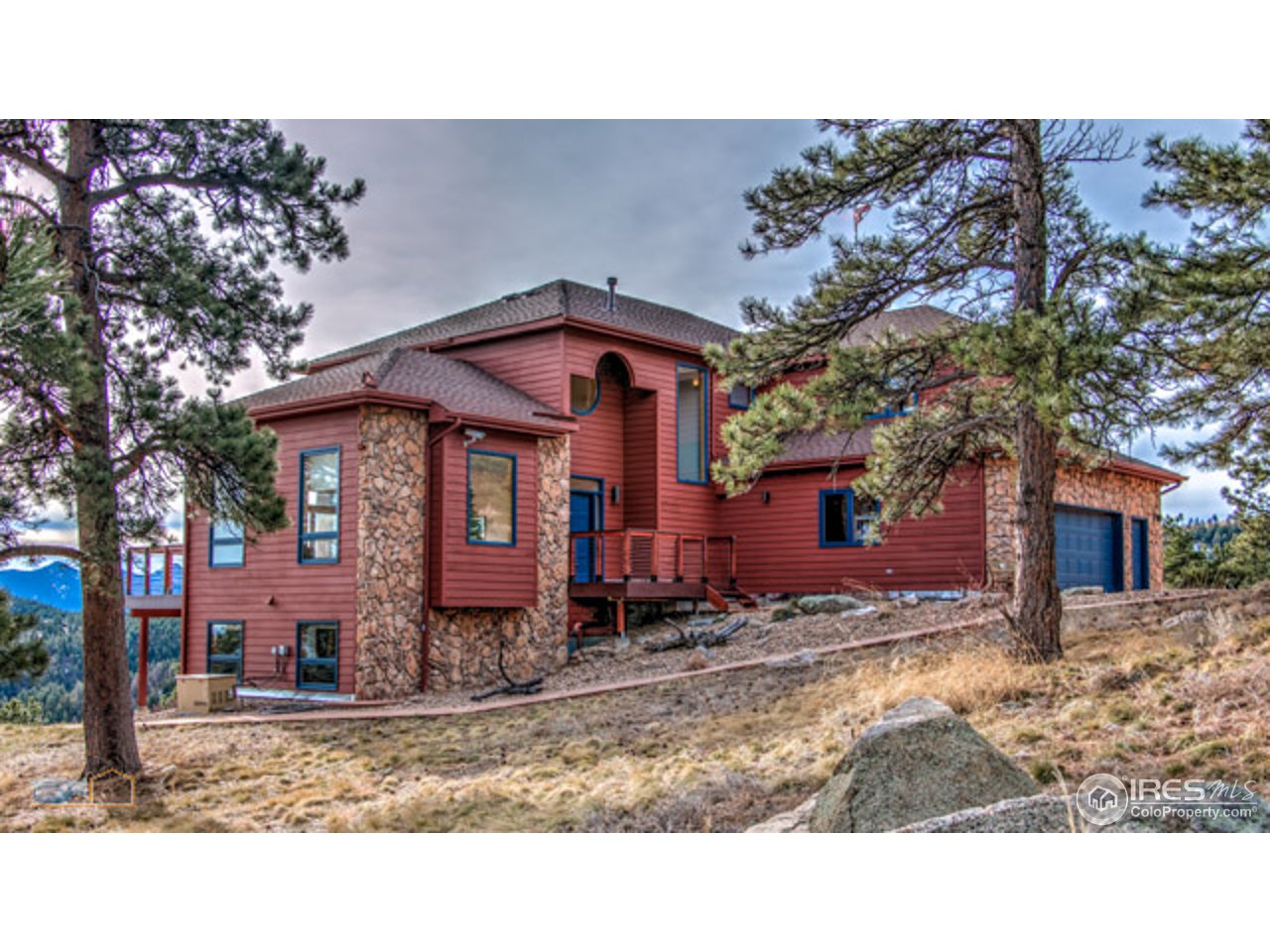 1385 West Coach Road Boulder, CO 80302 - Photo 1 of 25 a front view of a house with a yard