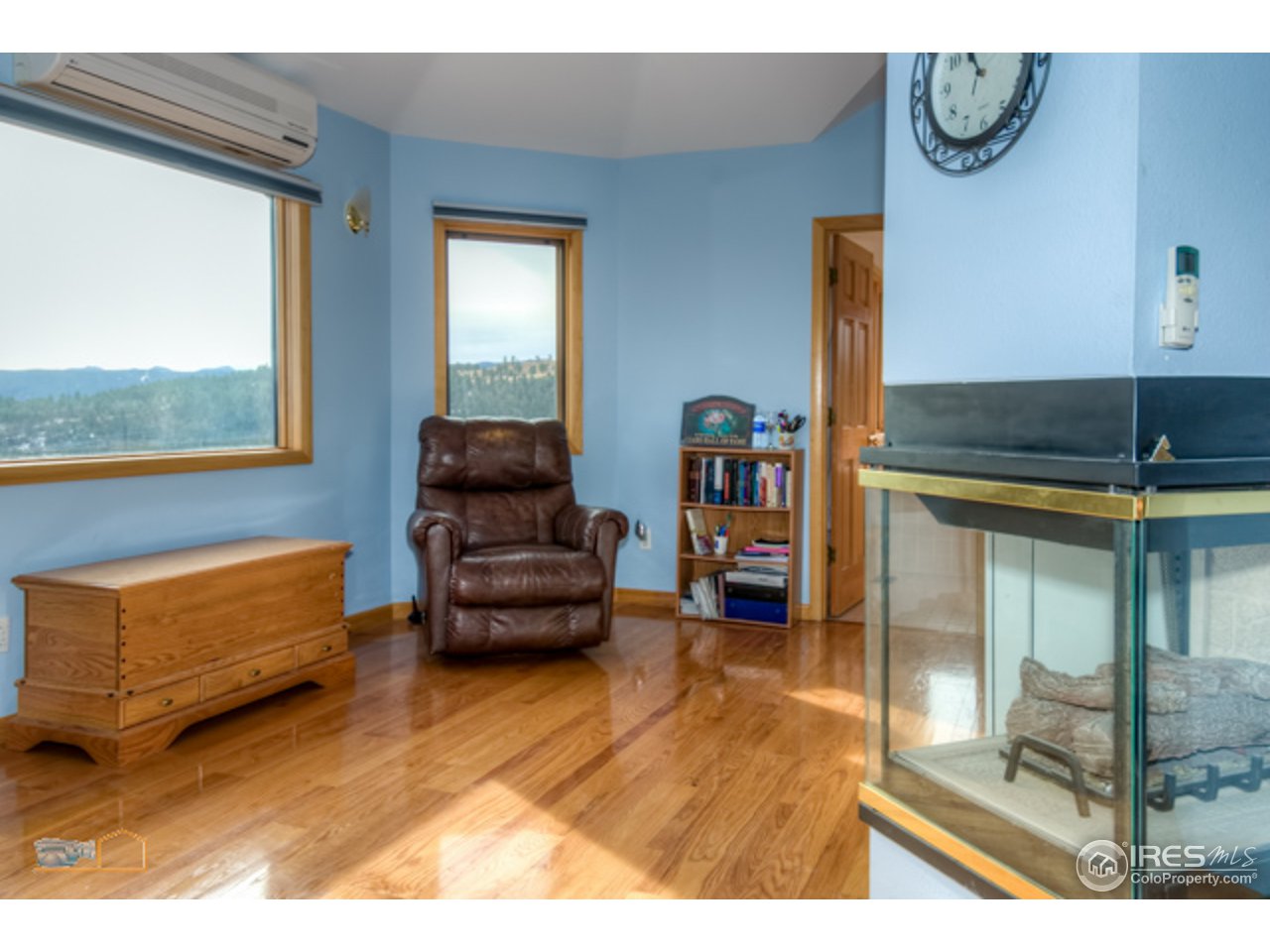 1385 West Coach Road Boulder, CO 80302 - Photo 13 of 25 a living room with furniture and a floor to ceiling window