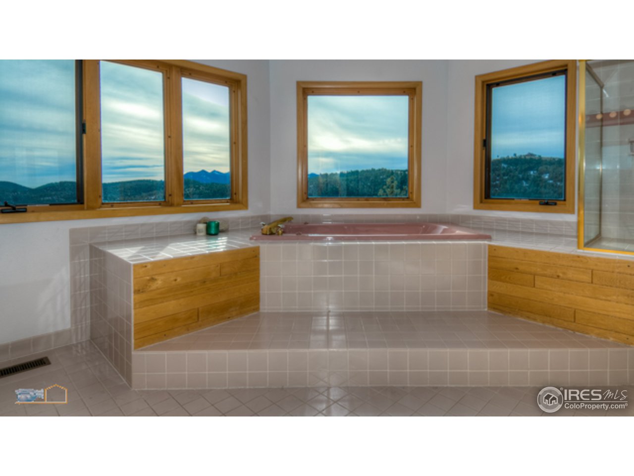 1385 West Coach Road Boulder, CO 80302 - Photo 15 of 25 a bathroom with a tub sink and window