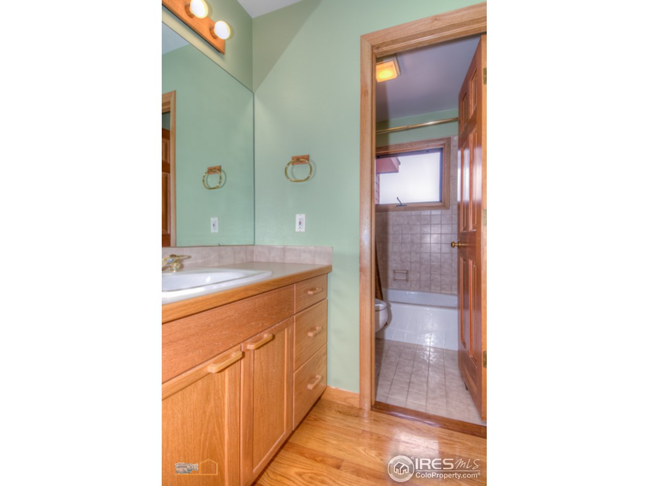 1385 West Coach Road Boulder, CO 80302 - Photo 18 of 25 a bathroom with a sink and a mirror
