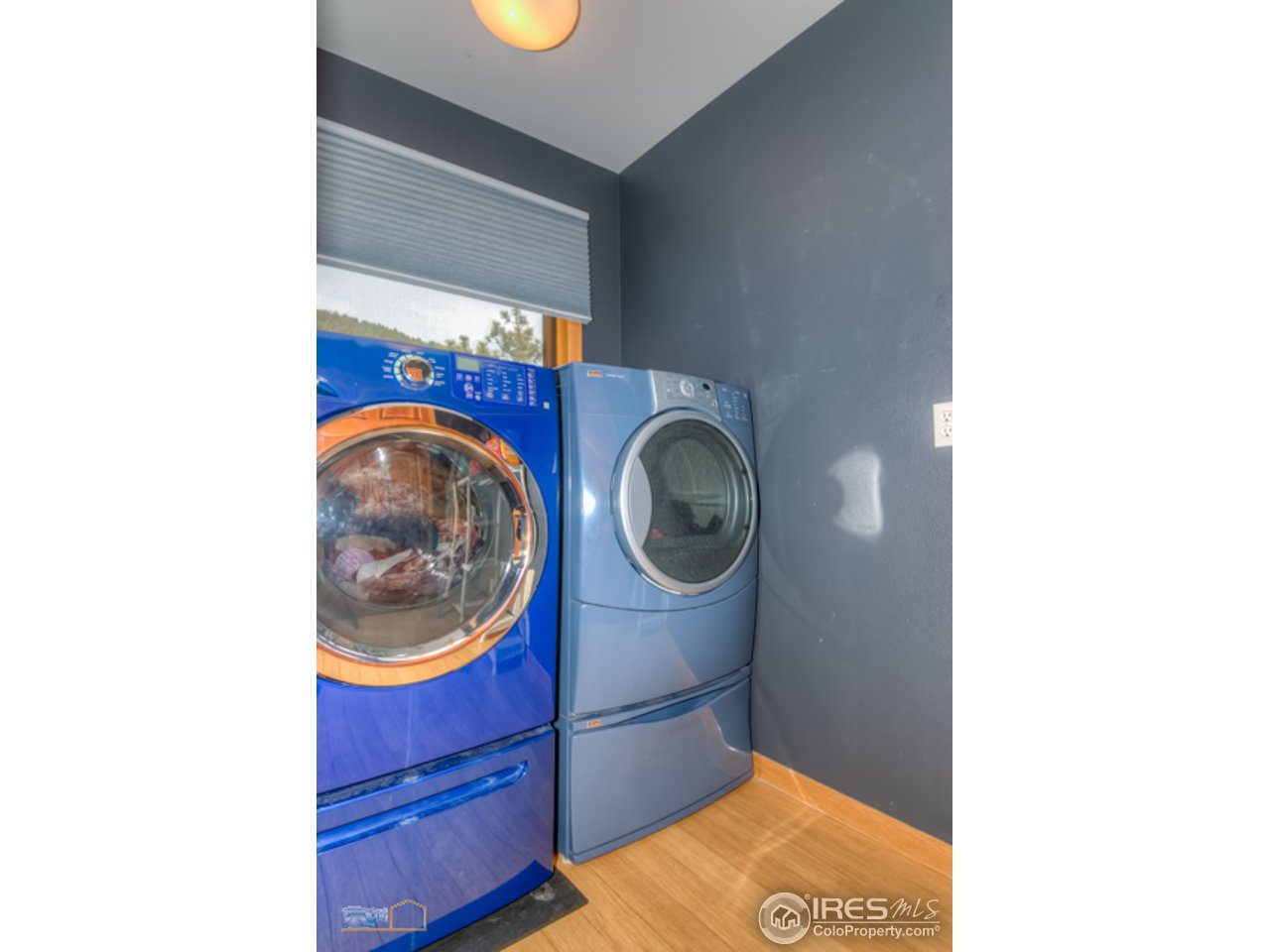 1385 West Coach Road Boulder, CO 80302 - Photo 19 of 25 a hallway with washer and dryer