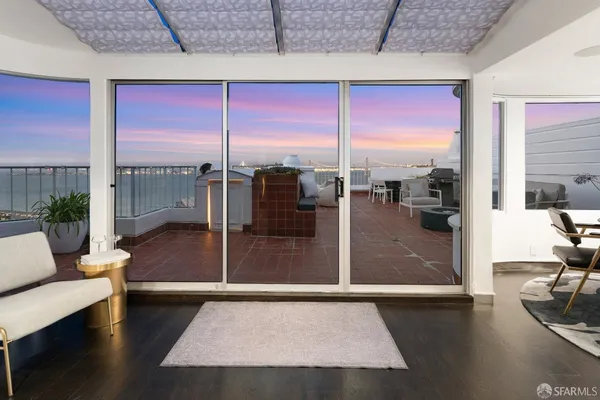 a view of a living room with furniture