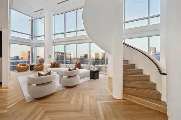 a very nice looking living room with a large window