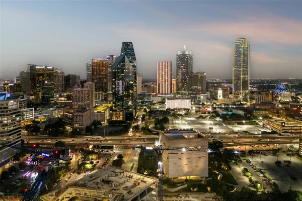 a view of a city with tall buildings