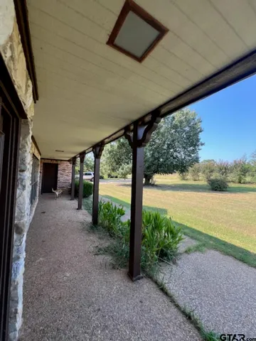 a view of backyard with green space