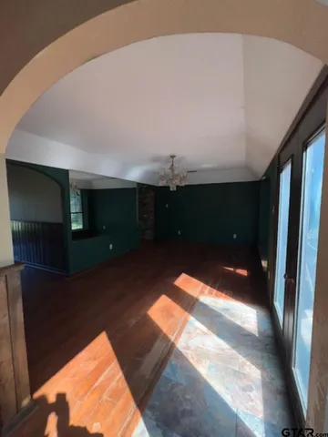 a view of a city and green space