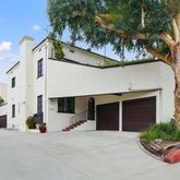 front view of a house with a street
