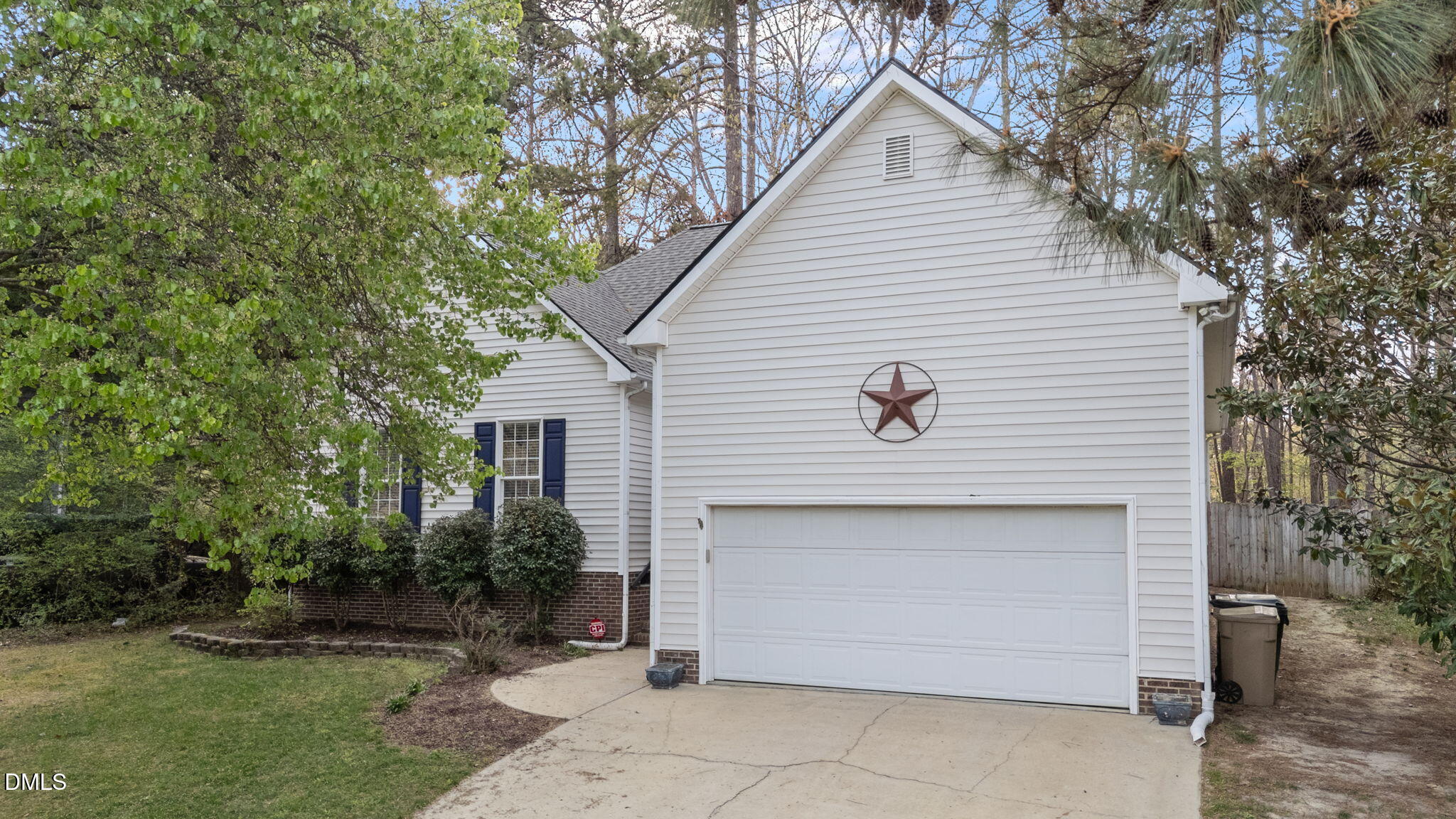 1641 Hall Boulevard Garner, NC 27529 - Photo 1 of 37 a front view of house with yard and trees