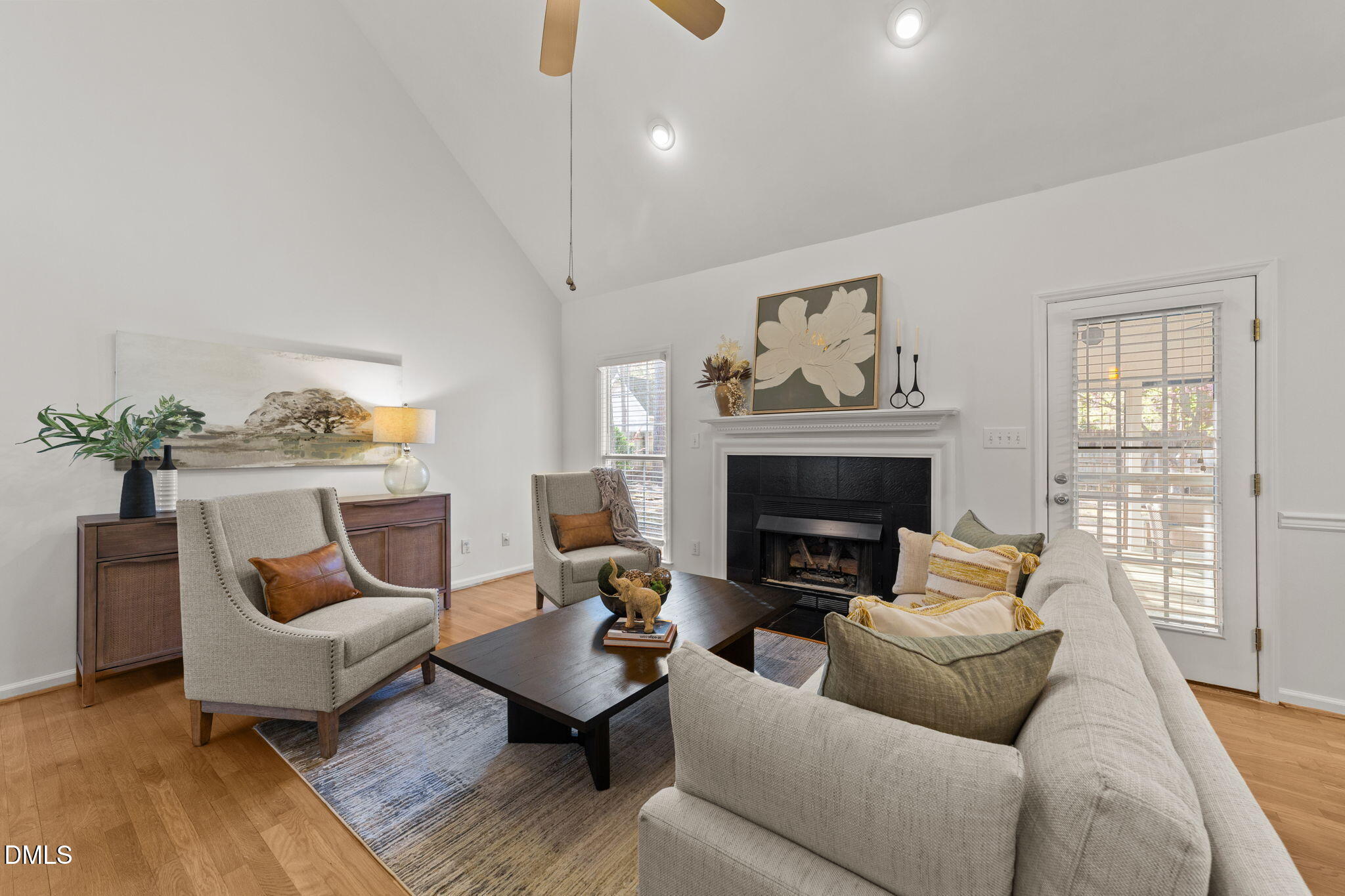 1641 Hall Boulevard Garner, NC 27529 - Photo 15 of 37 a living room with furniture and a fireplace