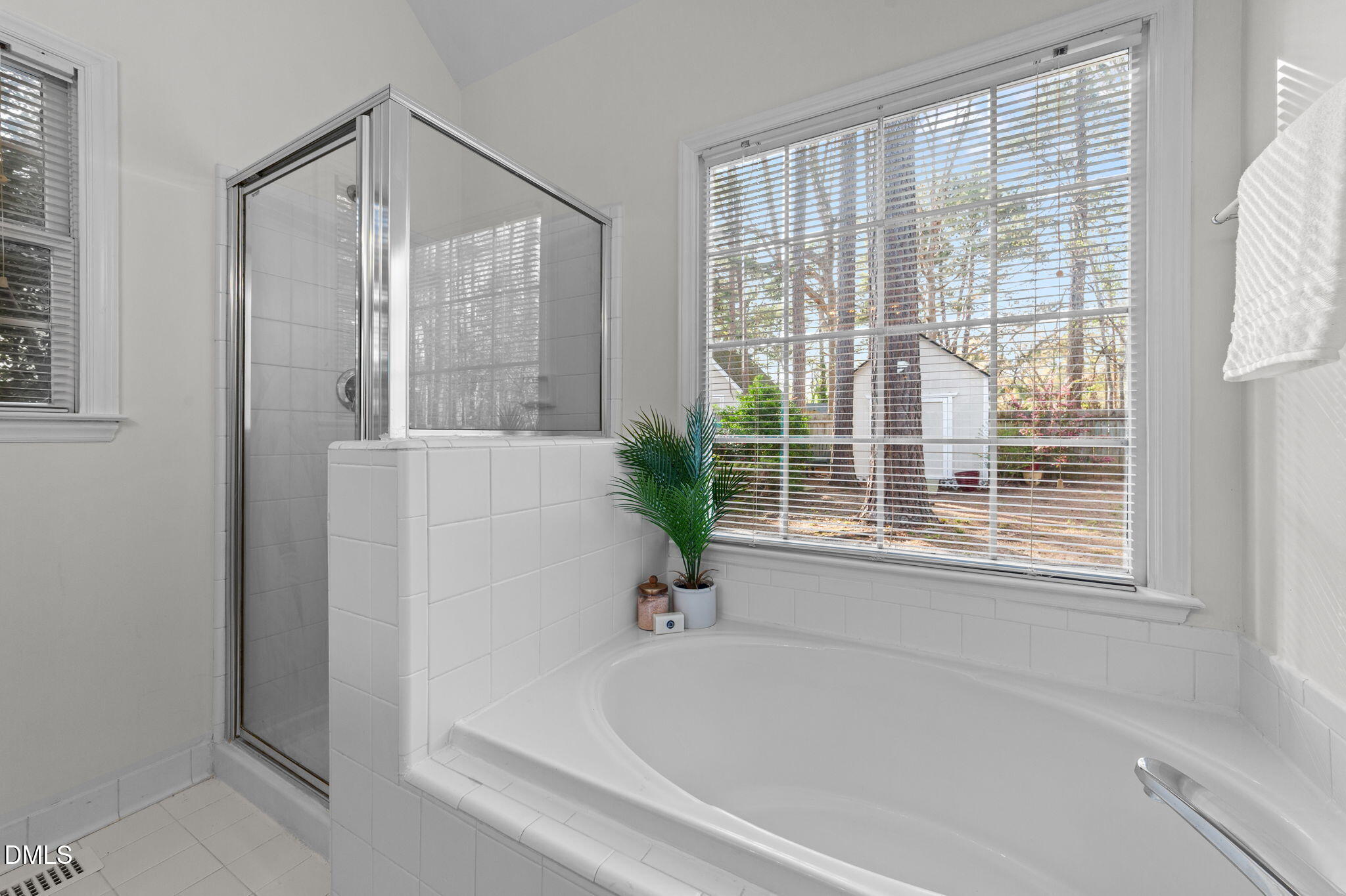 1641 Hall Boulevard Garner, NC 27529 - Photo 18 of 37 a white bath tub sitting next to a window
