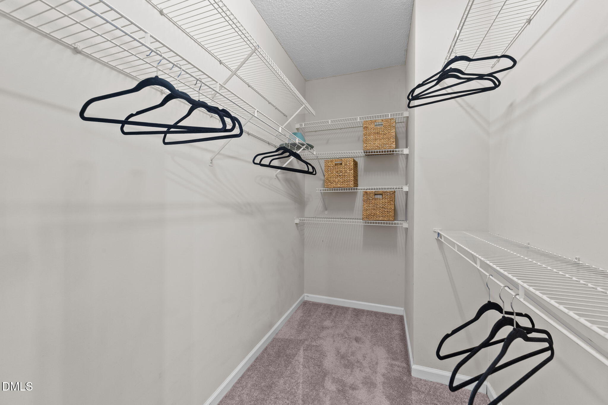 1641 Hall Boulevard Garner, NC 27529 - Photo 19 of 37 a view of a walk in closet