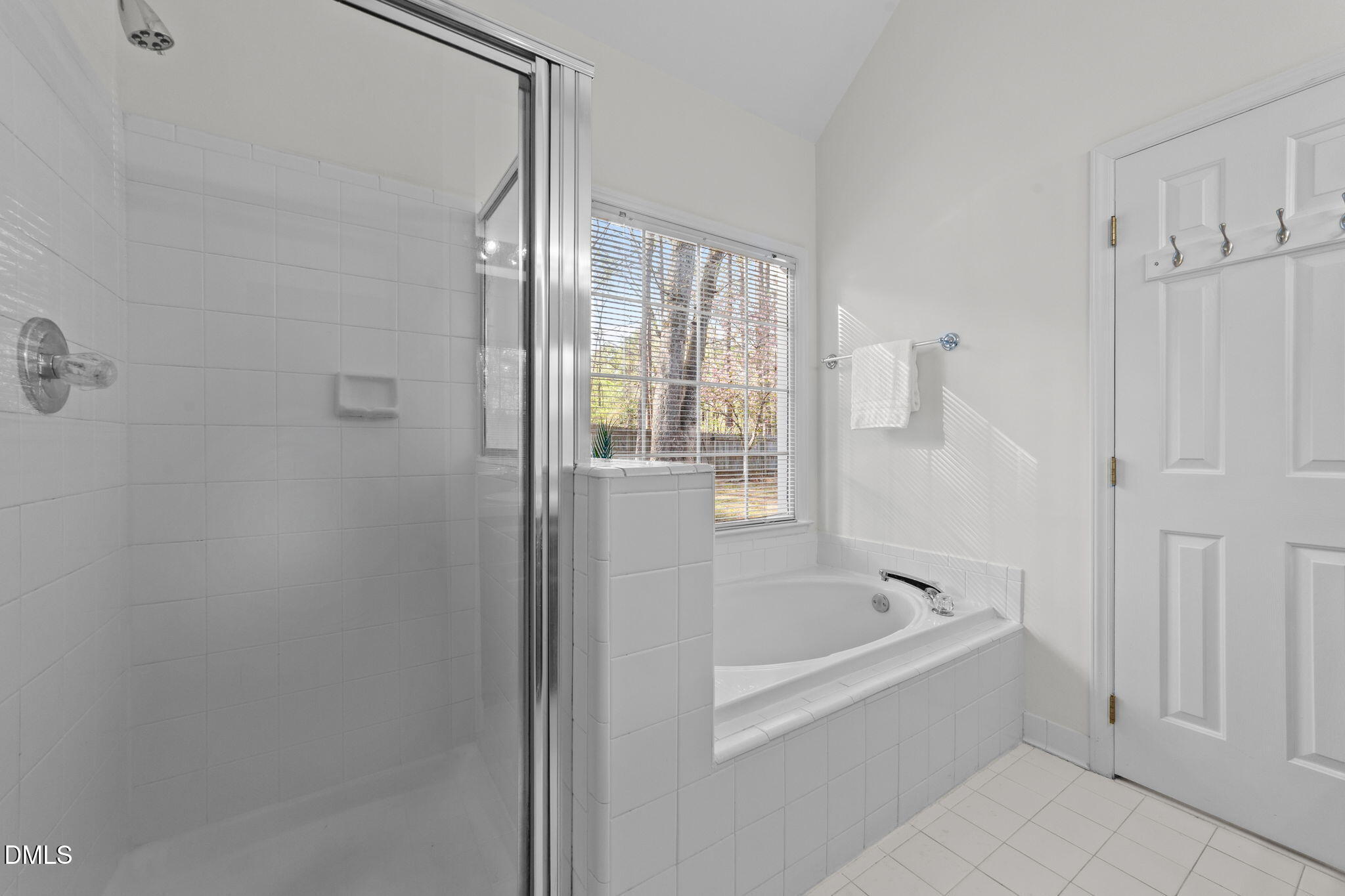 1641 Hall Boulevard Garner, NC 27529 - Photo 20 of 37 a white bath tub sitting next to a shower
