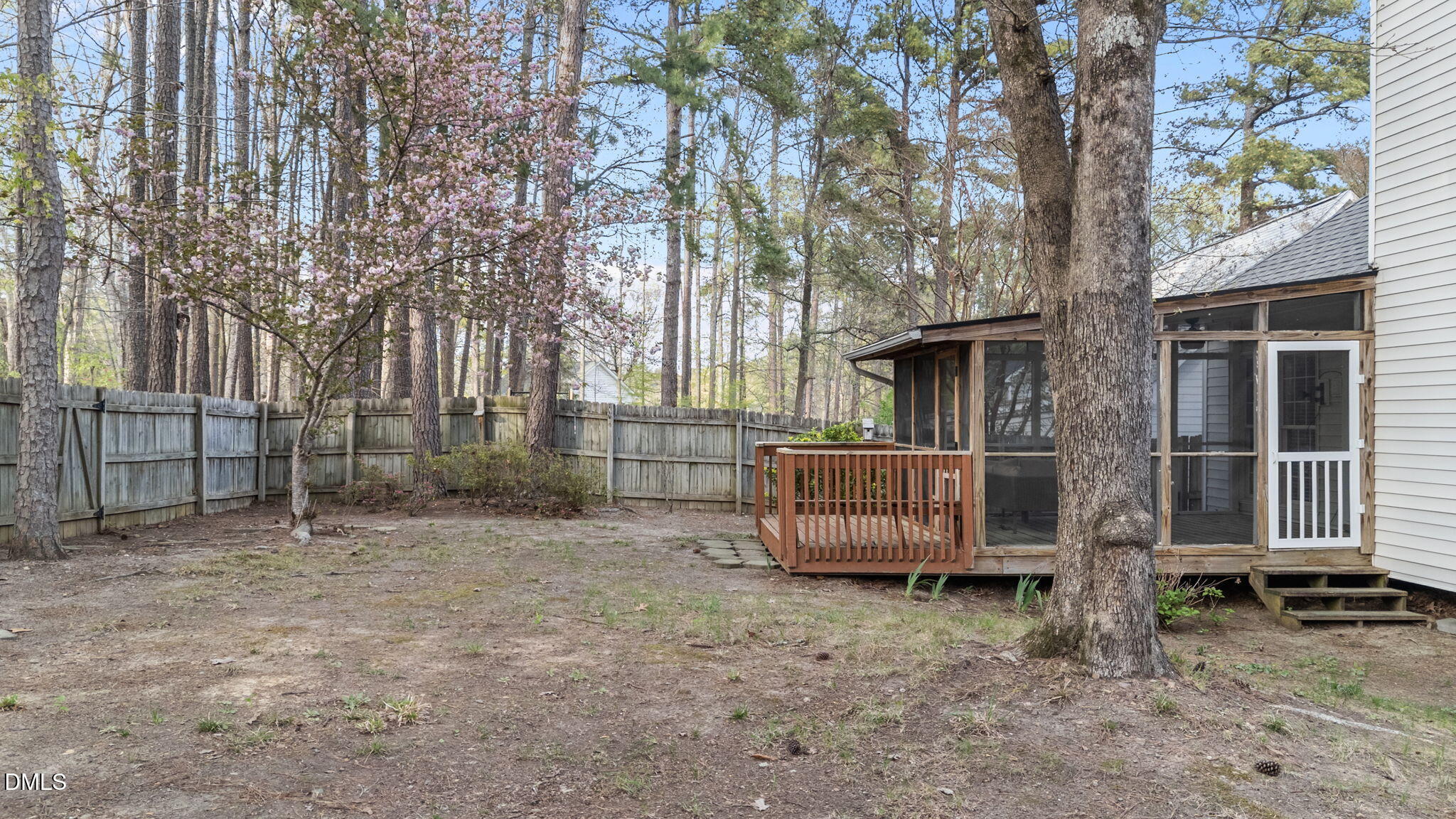 1641 Hall Boulevard Garner, NC 27529 - Photo 33 of 37 a view of backyard with barbeque grill and wooden fence