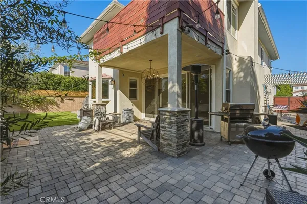a view of a chairs and a tables in the patio