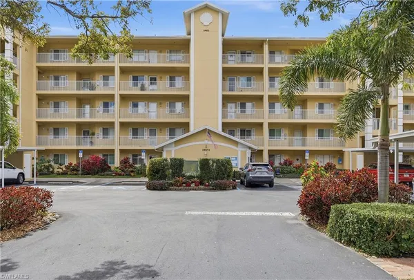 a front view of a building with street view