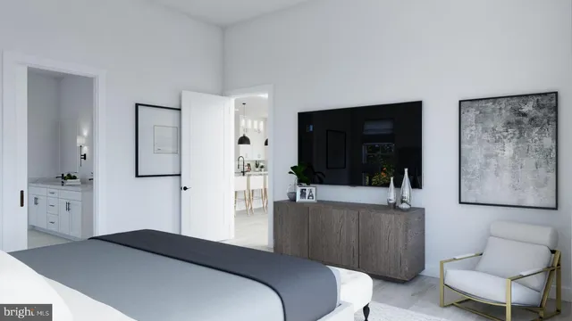 a bedroom with a bed and a couch