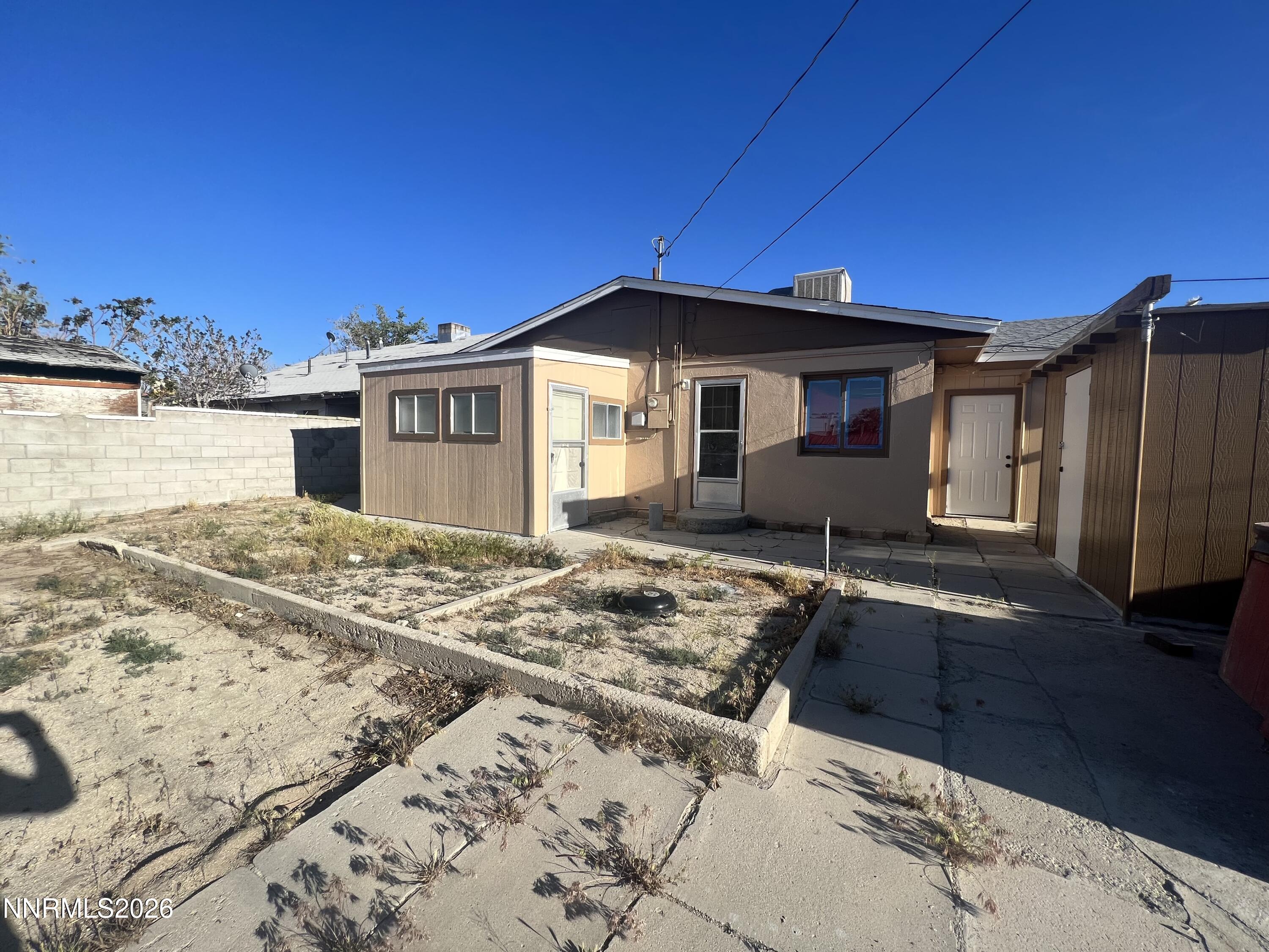 117 West 4th Street Hawthorne, NV 89415 - Photo 33 of 47 a front view of a house with a yard