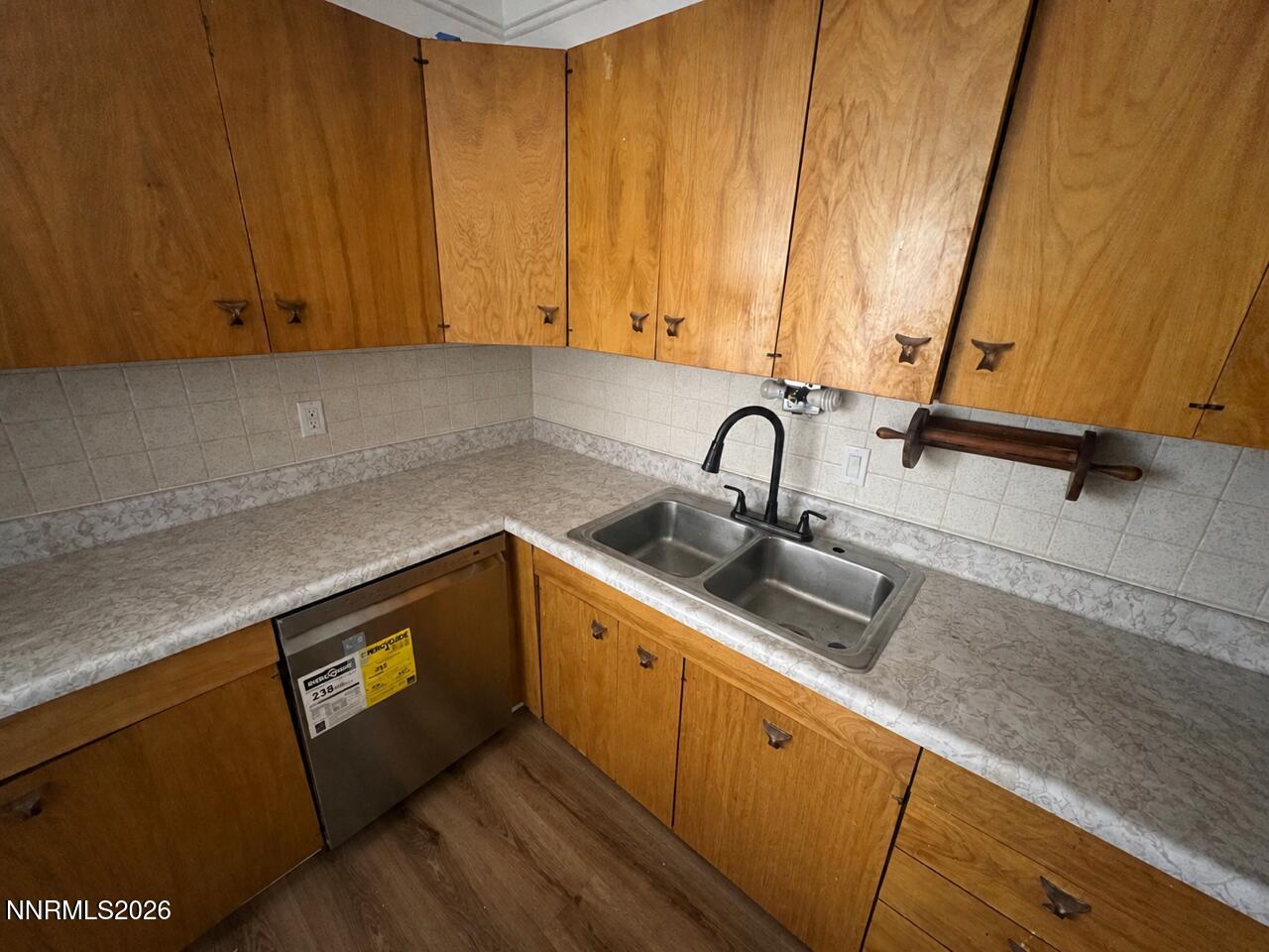 117 West 4th Street Hawthorne, NV 89415 - Photo 6 of 47 a kitchen with a sink cabinets and appliances