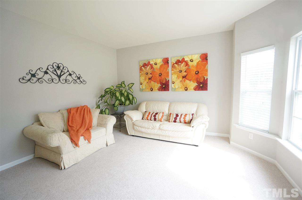 5109 Chasteal Trail Raleigh, NC 27610 - Photo 2 of 25 Bright & inviting Living Room sets the tone for the rest of the home.
