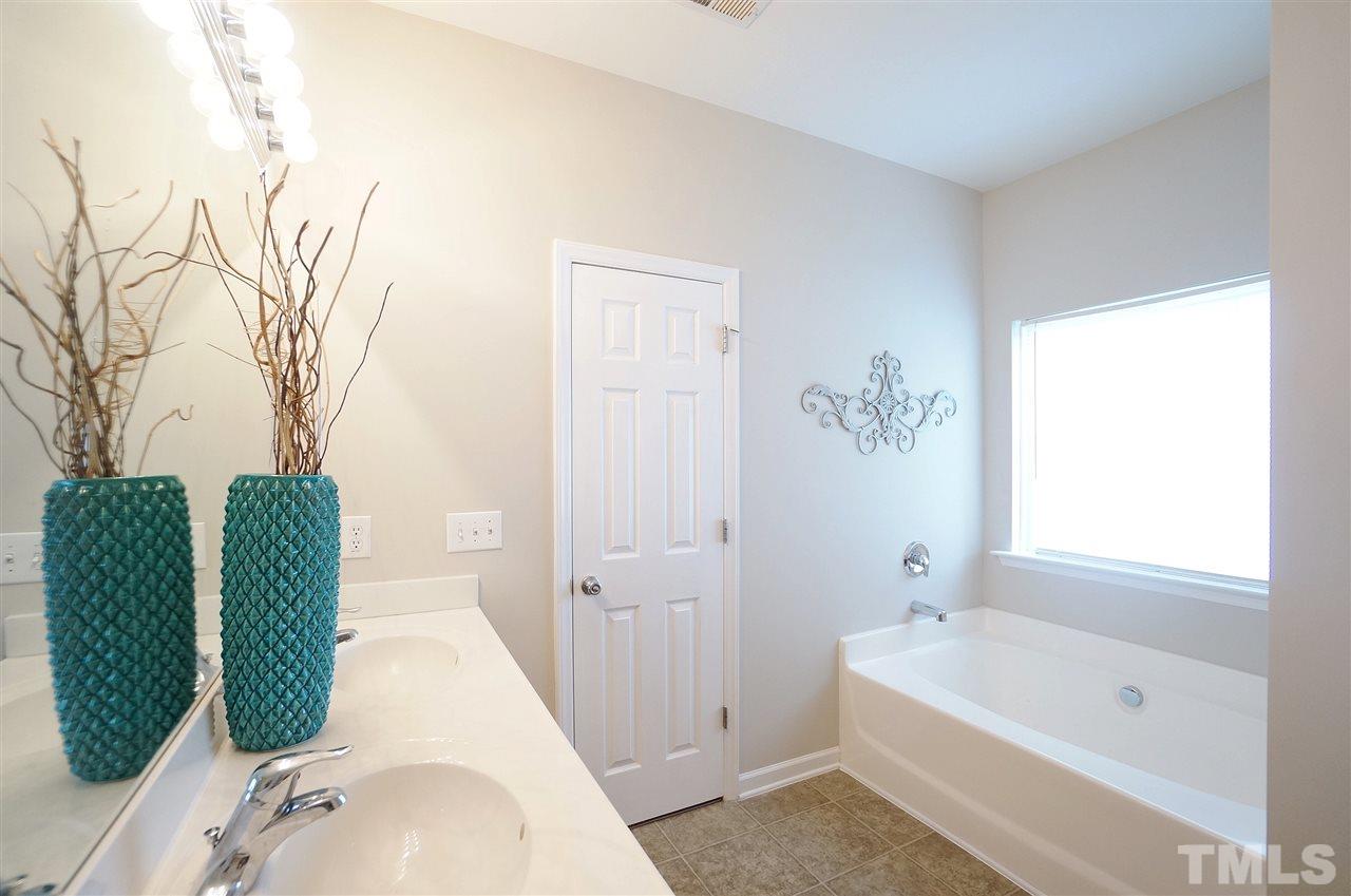5109 Chasteal Trail Raleigh, NC 27610 - Photo 15 of 25 Beautiful natural lighting, large garden tub.