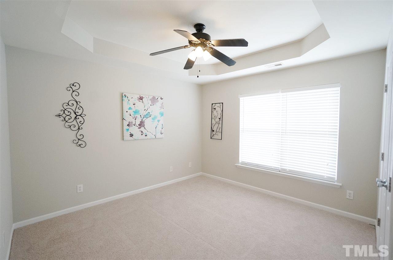 5109 Chasteal Trail Raleigh, NC 27610 - Photo 16 of 25 Spacious & versatile bedroom has stylish trey ceiling, large closet and Jack & Jill bathroom.