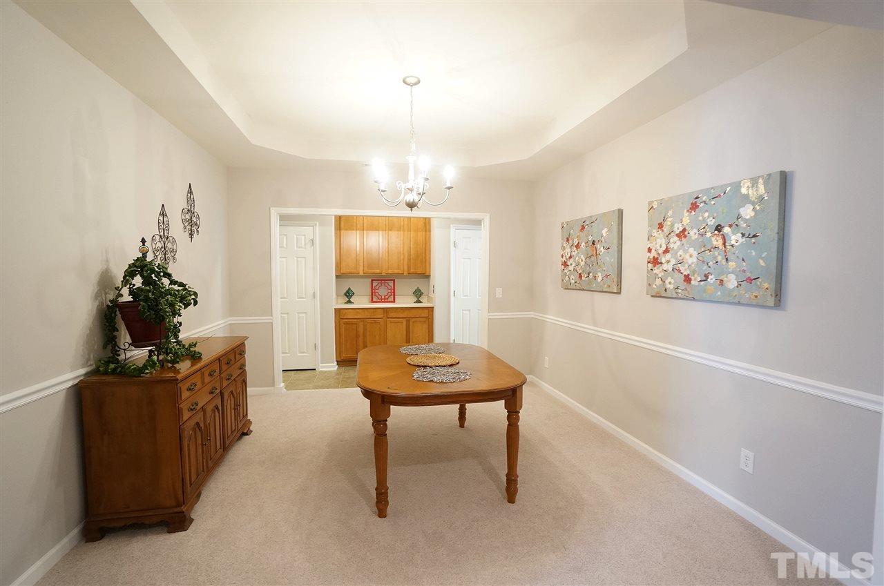 5109 Chasteal Trail Raleigh, NC 27610 - Photo 3 of 25 Spacious Dining room is ready to host gatherings large or small.