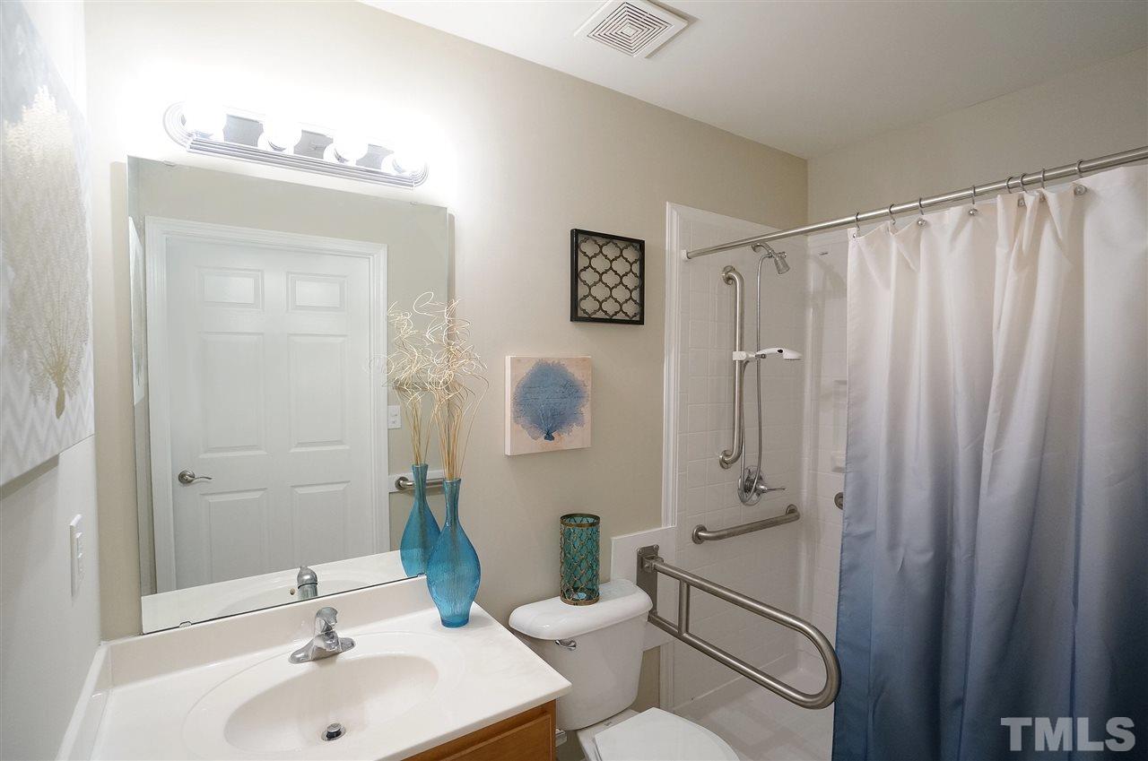 5109 Chasteal Trail Raleigh, NC 27610 - Photo 21 of 25 Hall bath is wheelchair & handicap accessible.
