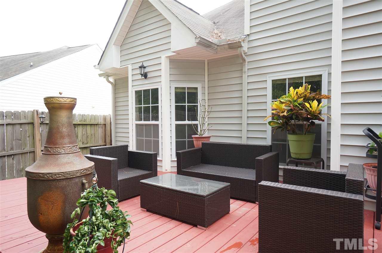 5109 Chasteal Trail Raleigh, NC 27610 - Photo 23 of 25 Large back deck has ample space for outdoor furniture arrangement, perfect for enjoying the outdoors & entertaining.