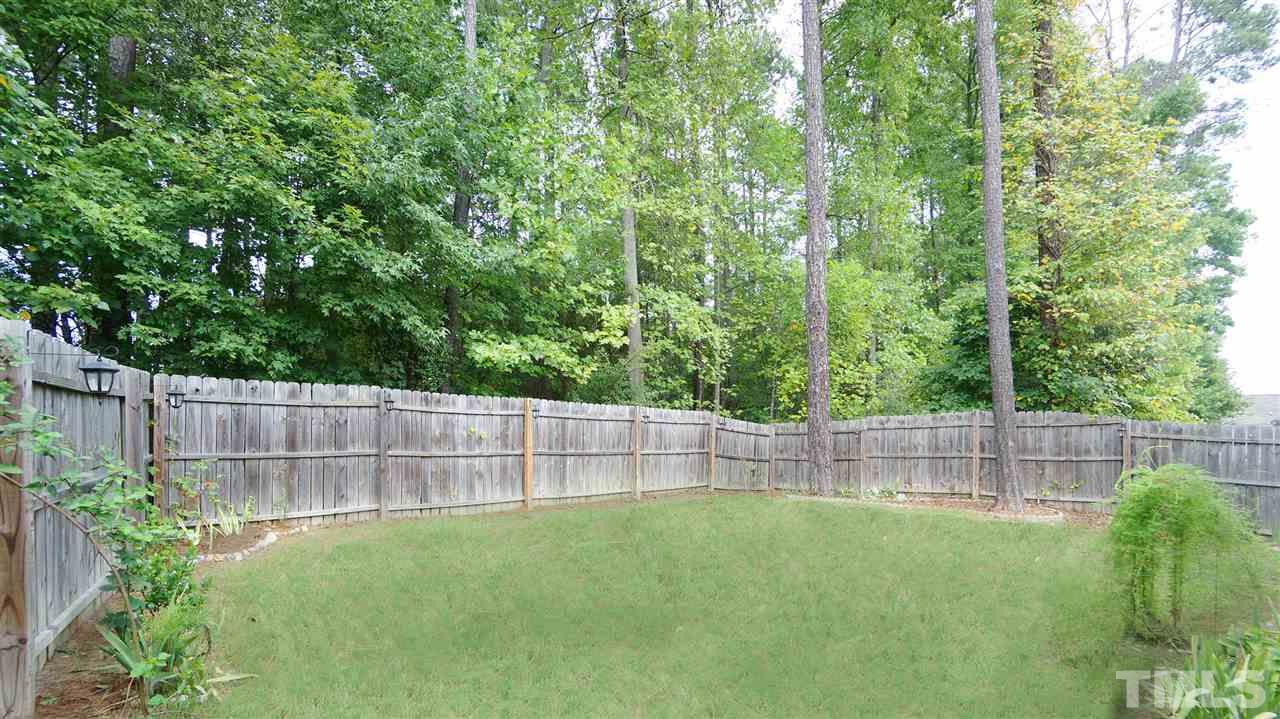 5109 Chasteal Trail Raleigh, NC 27610 - Photo 25 of 25 Privacy fenced yard backs to wooded lot.