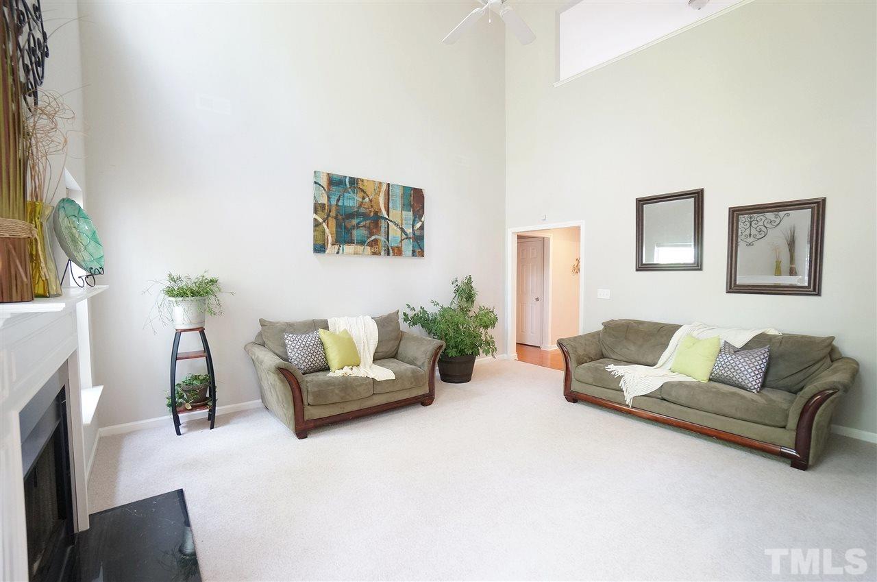 5109 Chasteal Trail Raleigh, NC 27610 - Photo 9 of 25 Family room has beautiful natural lighting and inviting feel.