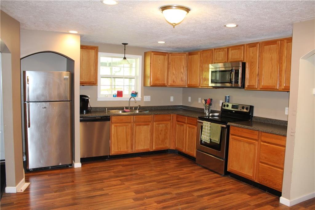360 Narigon Run Road Claysville, PA 15323 - Photo 2 of 21 Stainless Steel appliances, ample counter space and cabinets are featured in your new Kitchen.