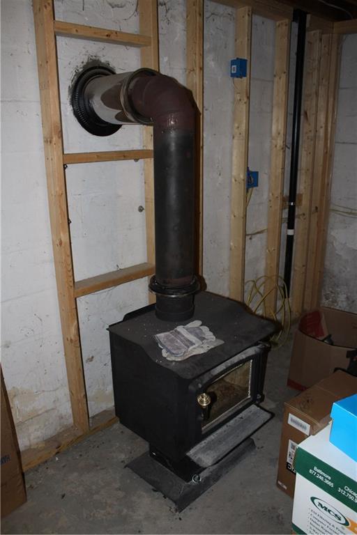 360 Narigon Run Road Claysville, PA 15323 - Photo 17 of 21 Additional woodburner located in the basement to offset your heating bill