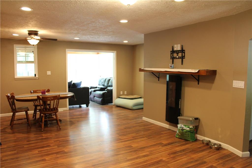 360 Narigon Run Road Claysville, PA 15323 - Photo 4 of 21 Mantel and electric fireplace for ambience, with your flatscreen mount ready and waiting.