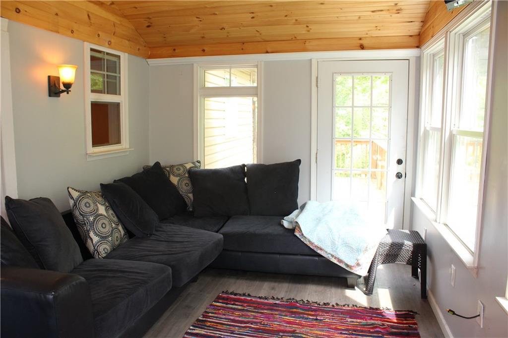 360 Narigon Run Road Claysville, PA 15323 - Photo 5 of 21 Directly off the Kitchen & Dining area is an enclosed porch bonus room that leads to the decks and with great wooded view.