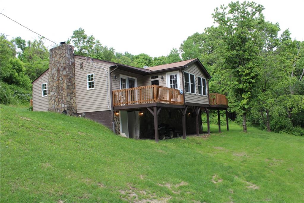 360 Narigon Run Road Claysville, PA 15323 - Photo 7 of 21 The raised private decks offer peace and privacy.