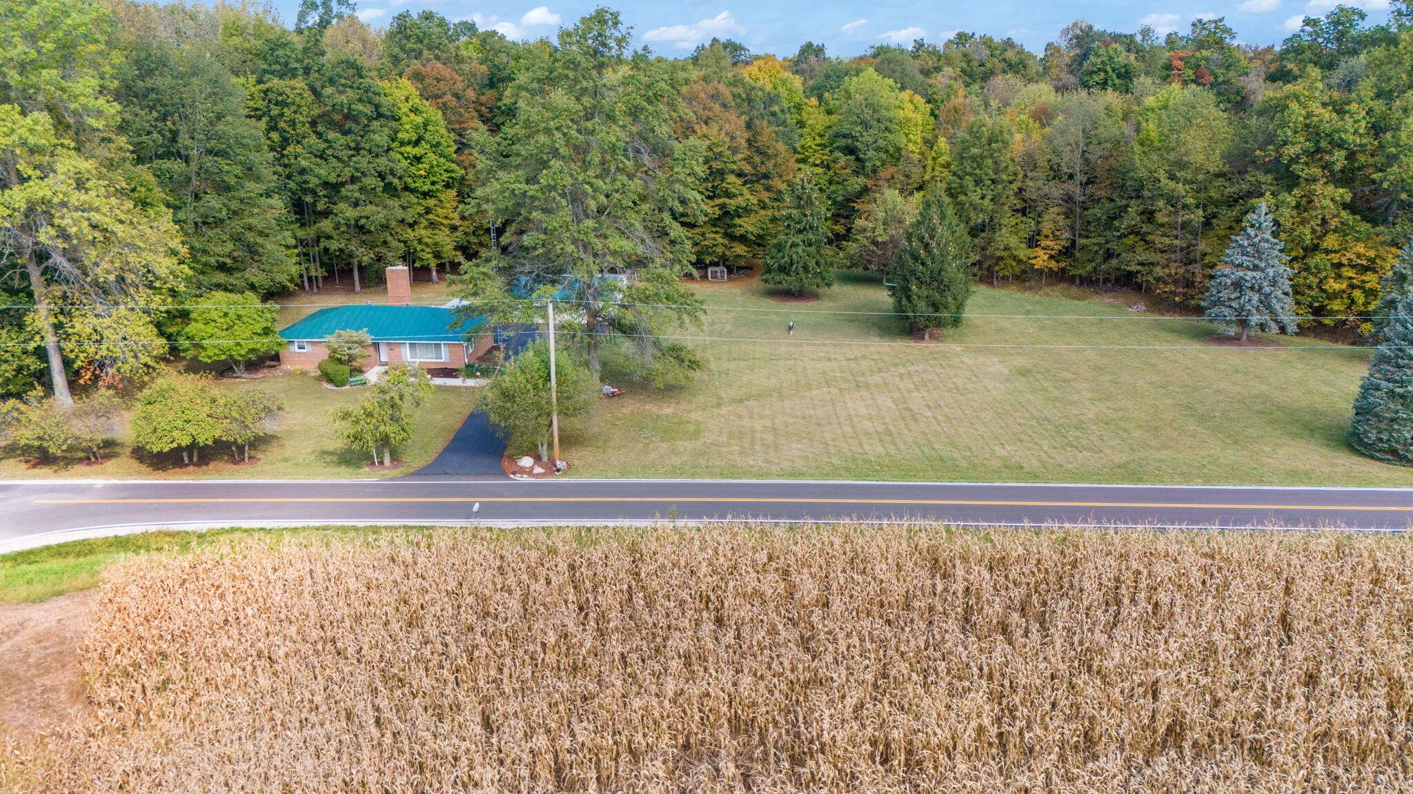 6073 Wickham Road Sycamore, OH 44882 - Photo 6 of 55 8-web-or-mls-DJI_20240925114157_0234_D
