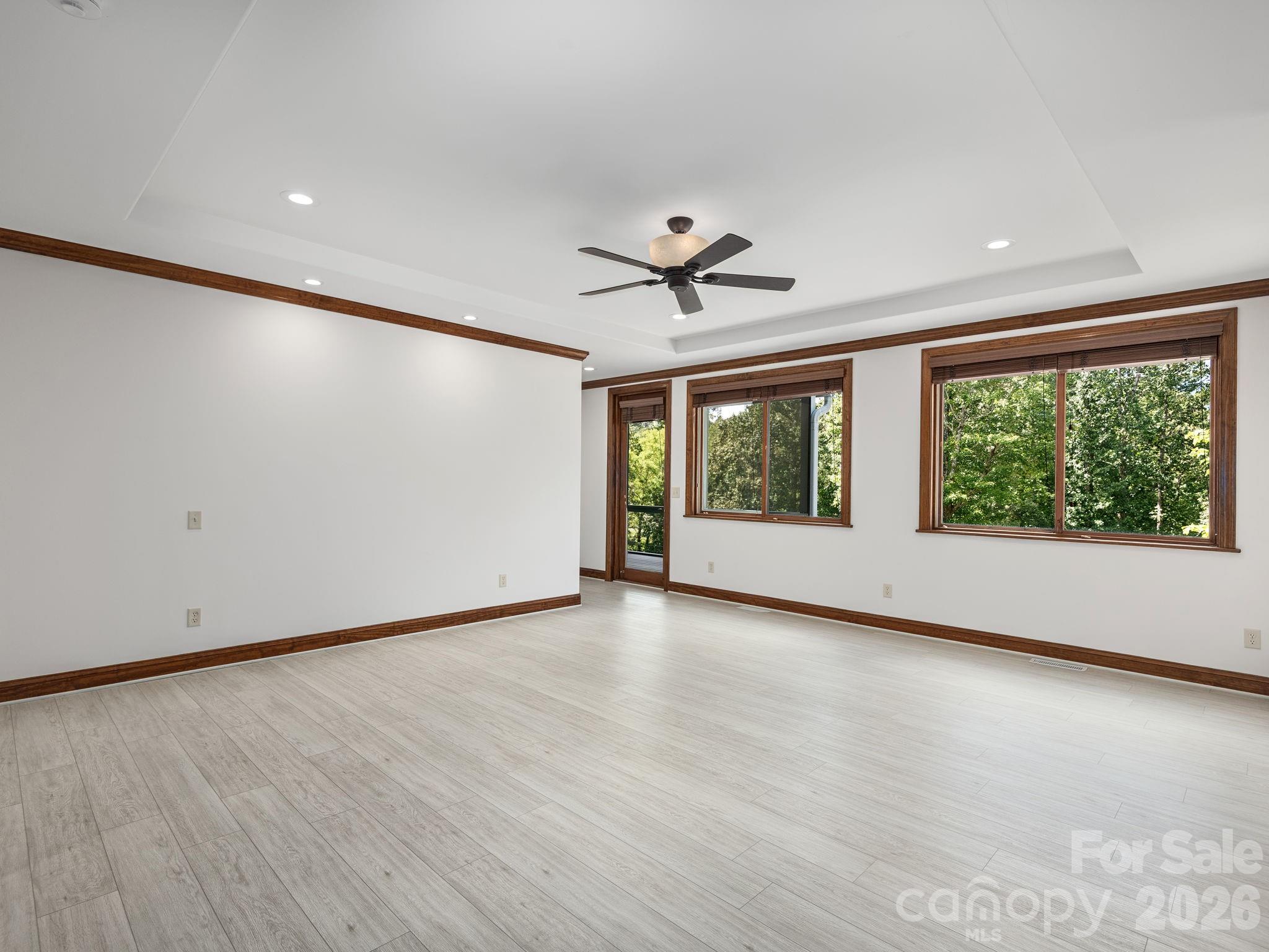 248 Wisdom Cove Road Flat Rock, NC 28731 - Photo 15 of 48 a view of an empty room with a window