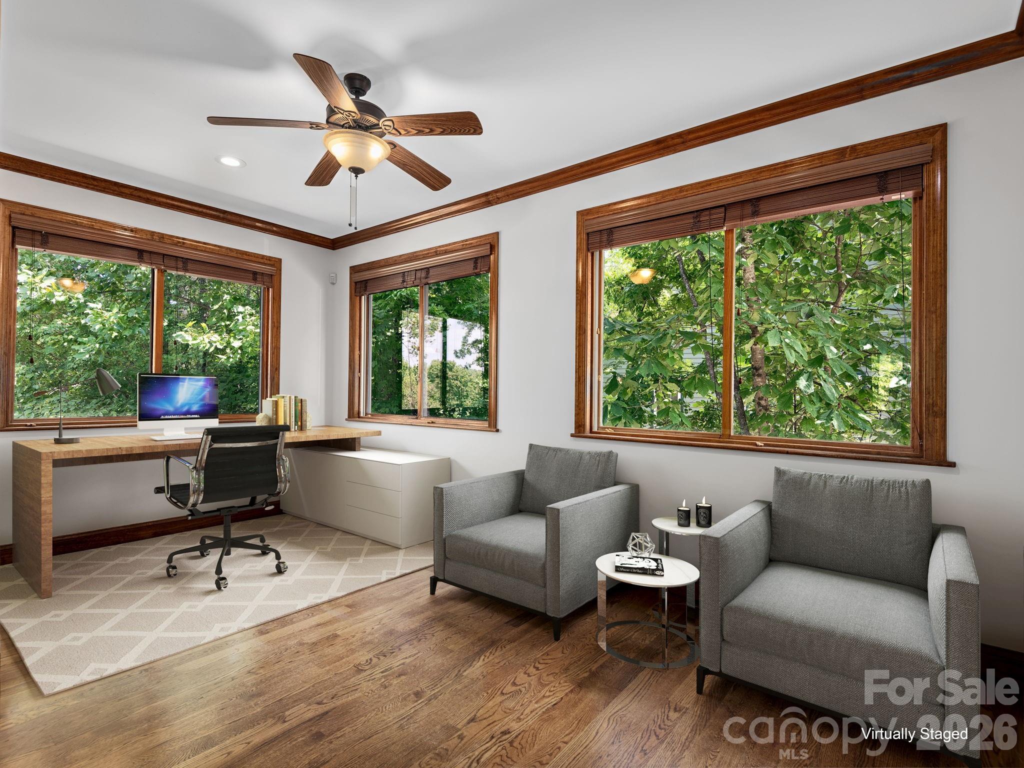 248 Wisdom Cove Road Flat Rock, NC 28731 - Photo 20 of 48 a living room with furniture and a large window
