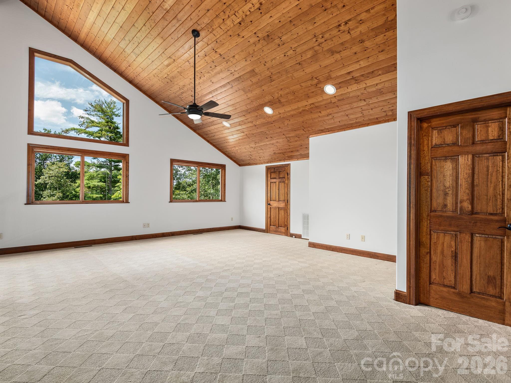248 Wisdom Cove Road Flat Rock, NC 28731 - Photo 24 of 48 a view of an empty room with a window