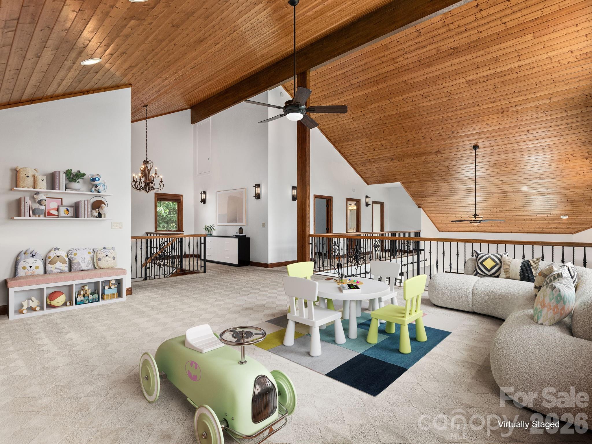 248 Wisdom Cove Road Flat Rock, NC 28731 - Photo 25 of 48 a living room with furniture and a table
