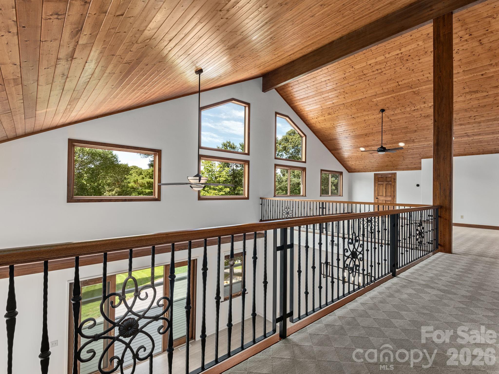 248 Wisdom Cove Road Flat Rock, NC 28731 - Photo 32 of 48 a view of staircase with a large window