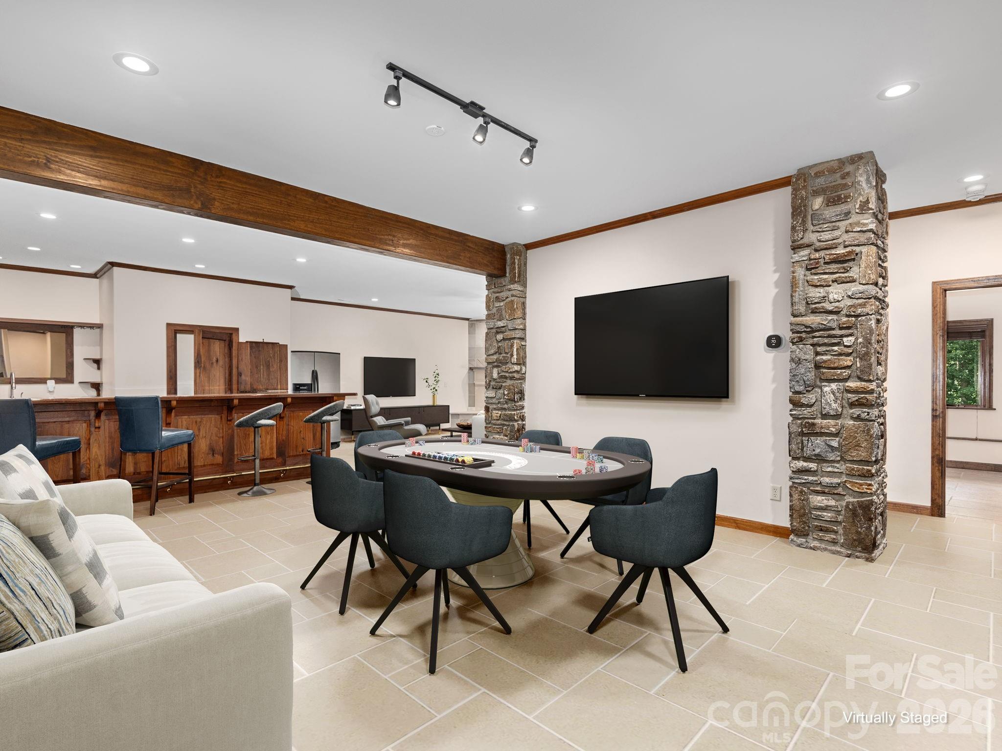 248 Wisdom Cove Road Flat Rock, NC 28731 - Photo 33 of 48 a living room with furniture and a flat screen tv